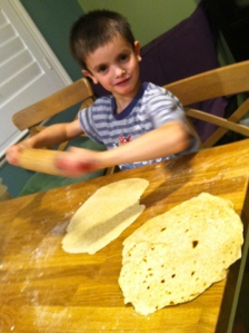 Sage rolling the dough